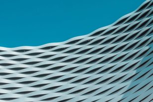 The side of a building with a wavy design