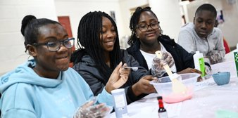 Community Event Process Card A Group Of Young Black Students Doing A Science Activit (51)
